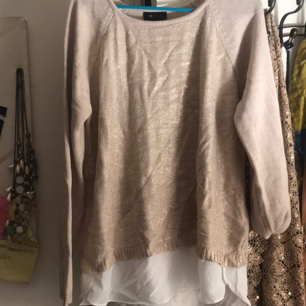 Oatmeal with white blouse “peek out” at bottom.